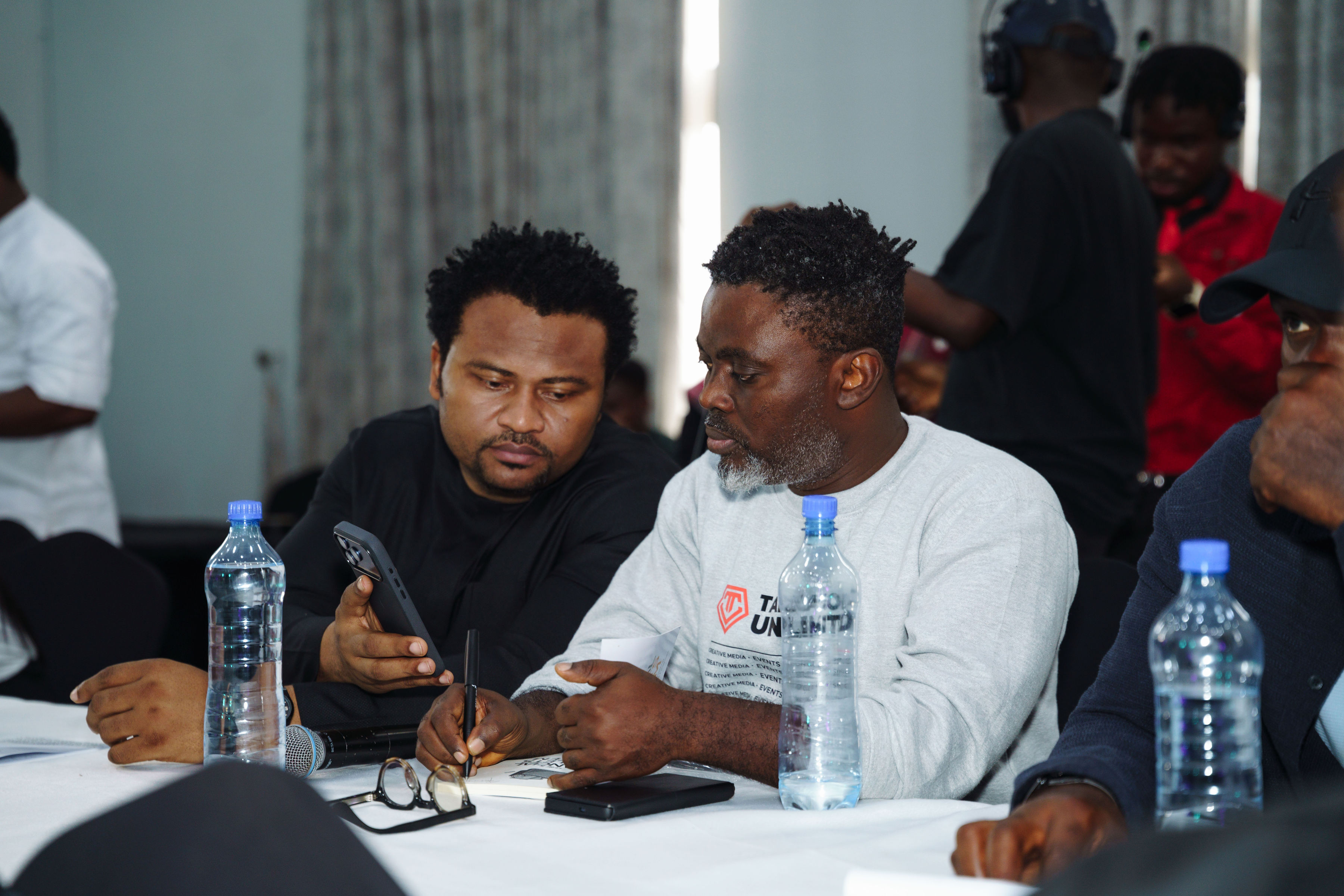 Attendees in conversation