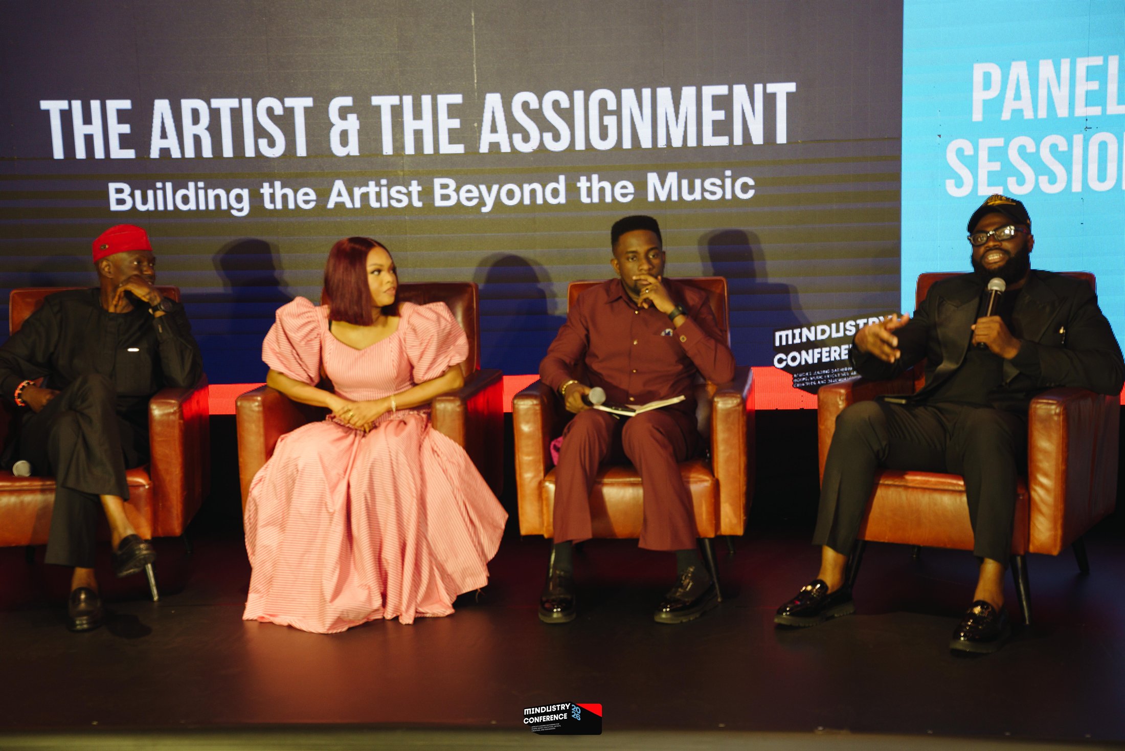 Panelists discussing the work of building an artist beyond the music
