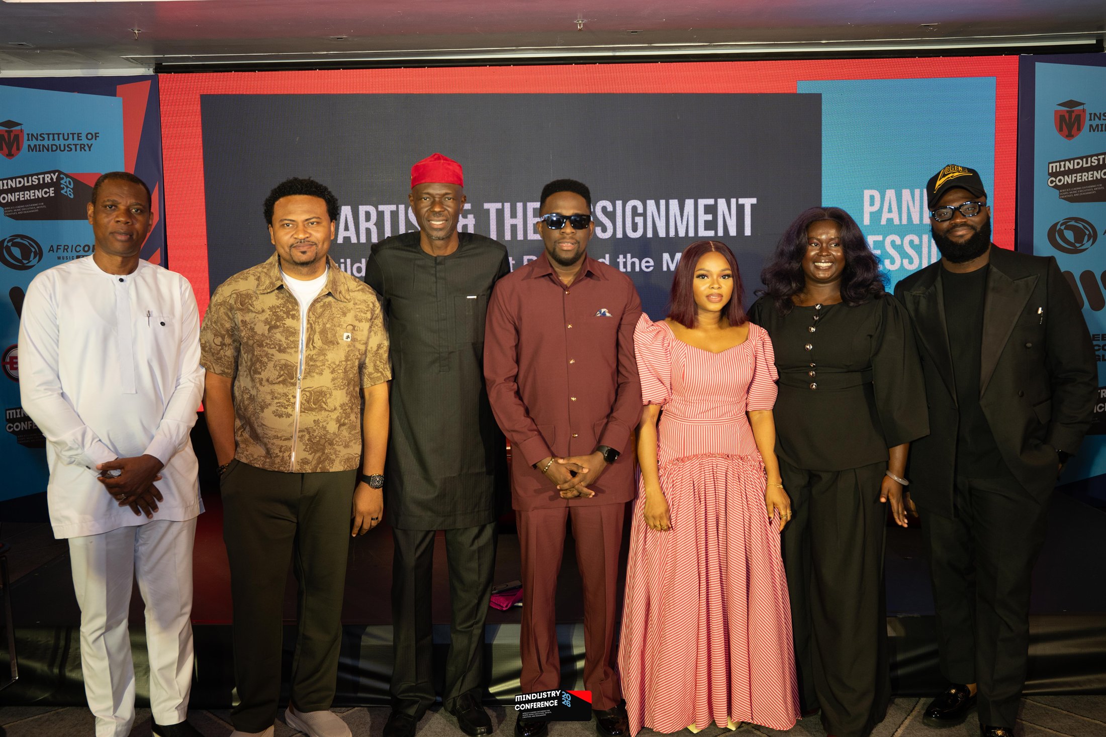 Conference speakers and panelists together on stage